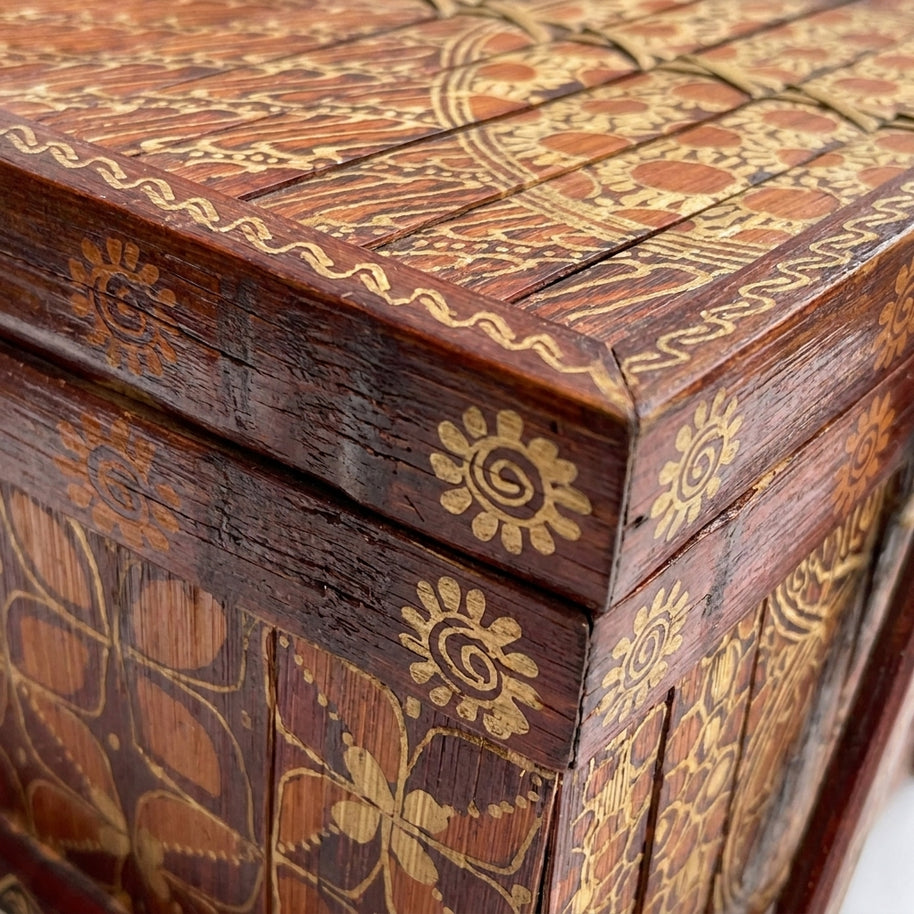 Close-up of the natural bamboo texture and hand-finished surface of the besek box
