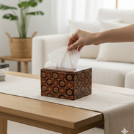 Square batik tissue box holding a standard tissue pack in a modern interior