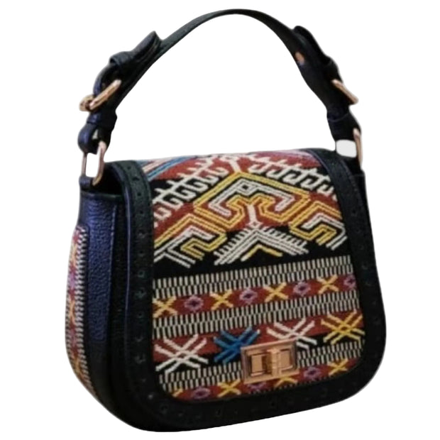 Lalita Crossbody Bag — leather construction and zipper detail