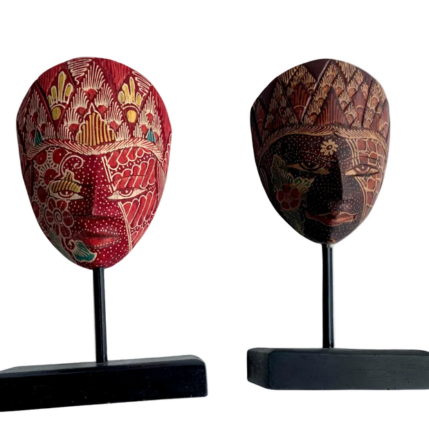 Hand-carved Panji topeng mask on a wooden stand, hand-painted in Java, Indonesia