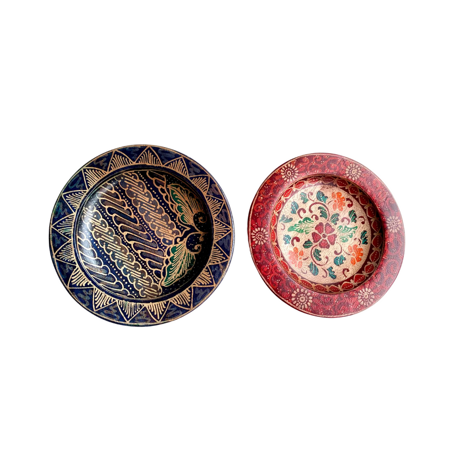 Hand-painted round plates from the Sanggarpeni workshop in Central Java, Indonesia