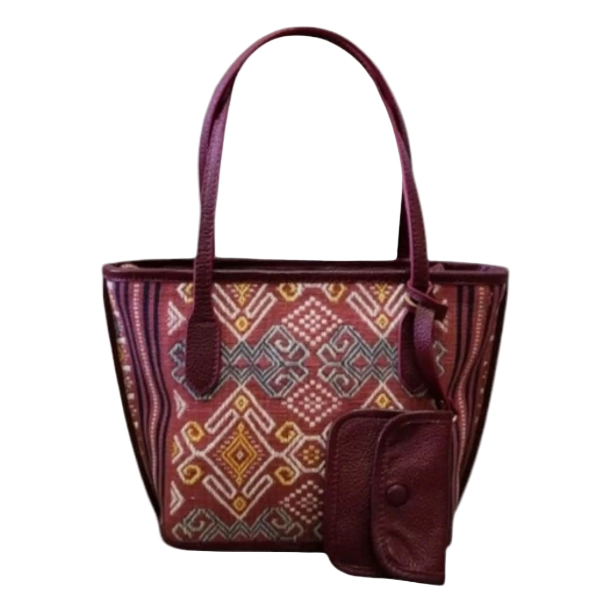 Seitenprofil der Nusa Mini Tote mit Lederstruktur und gewebtem Panel