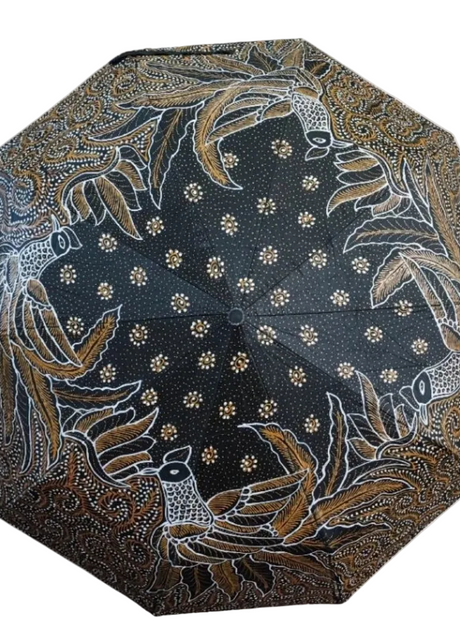Jumbo batik patterned umbrella with open canopy showing a traditional Yogyakarta motif