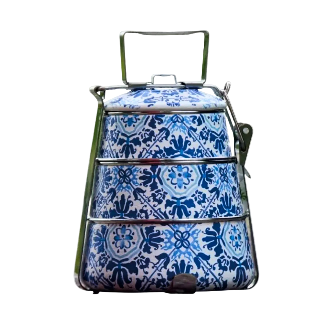 Detail of hand-painted batik motif on a stainless steel tiffin tier