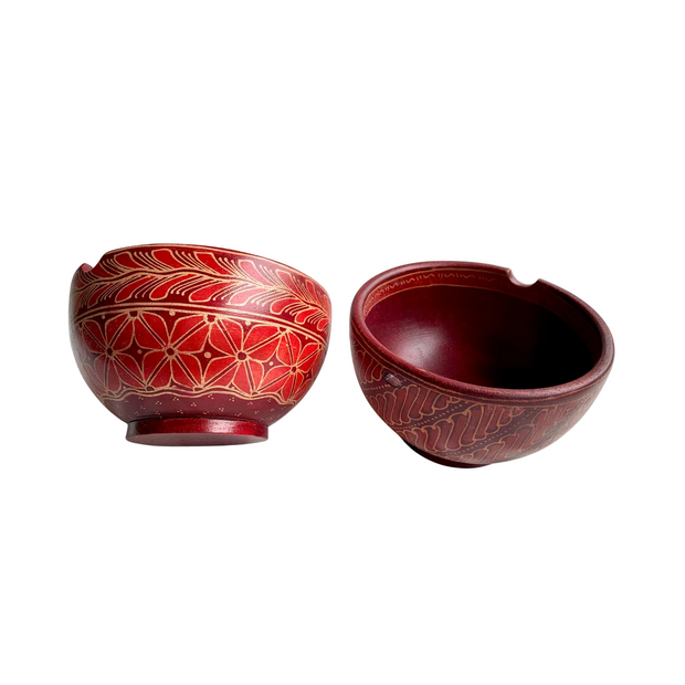 Hand-carved wooden noodle bowls from Central Java, Indonesia, showing natural grain