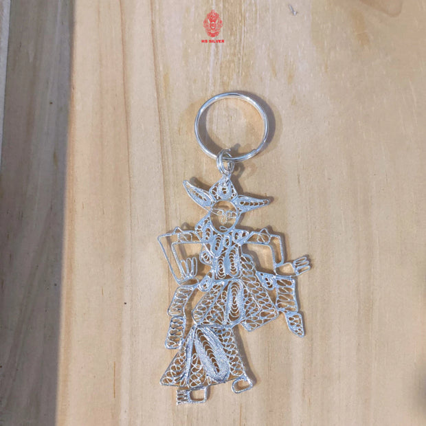 Versilberter handgefertigter Wayang-Schlüsselanhänger als Souvenir