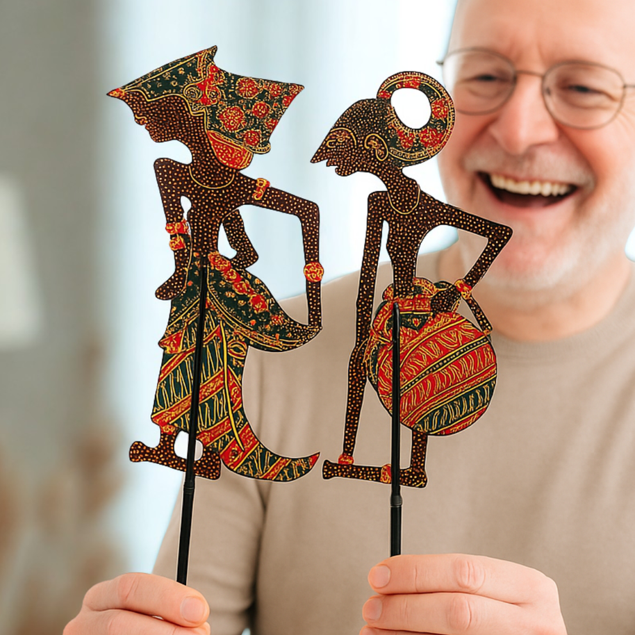 Hand-painted wayang figure showing carved detail and traditional motifs